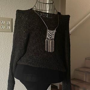 Two piece to, charcoal color used like new. Necklace sold separately